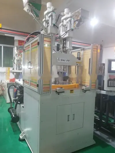Vertical insert molding
